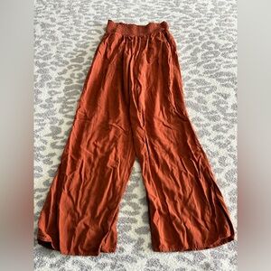 orange wide leg smocked waist pants